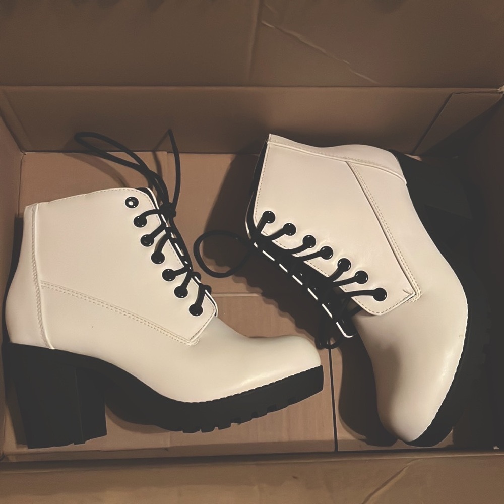 White boots with black laces